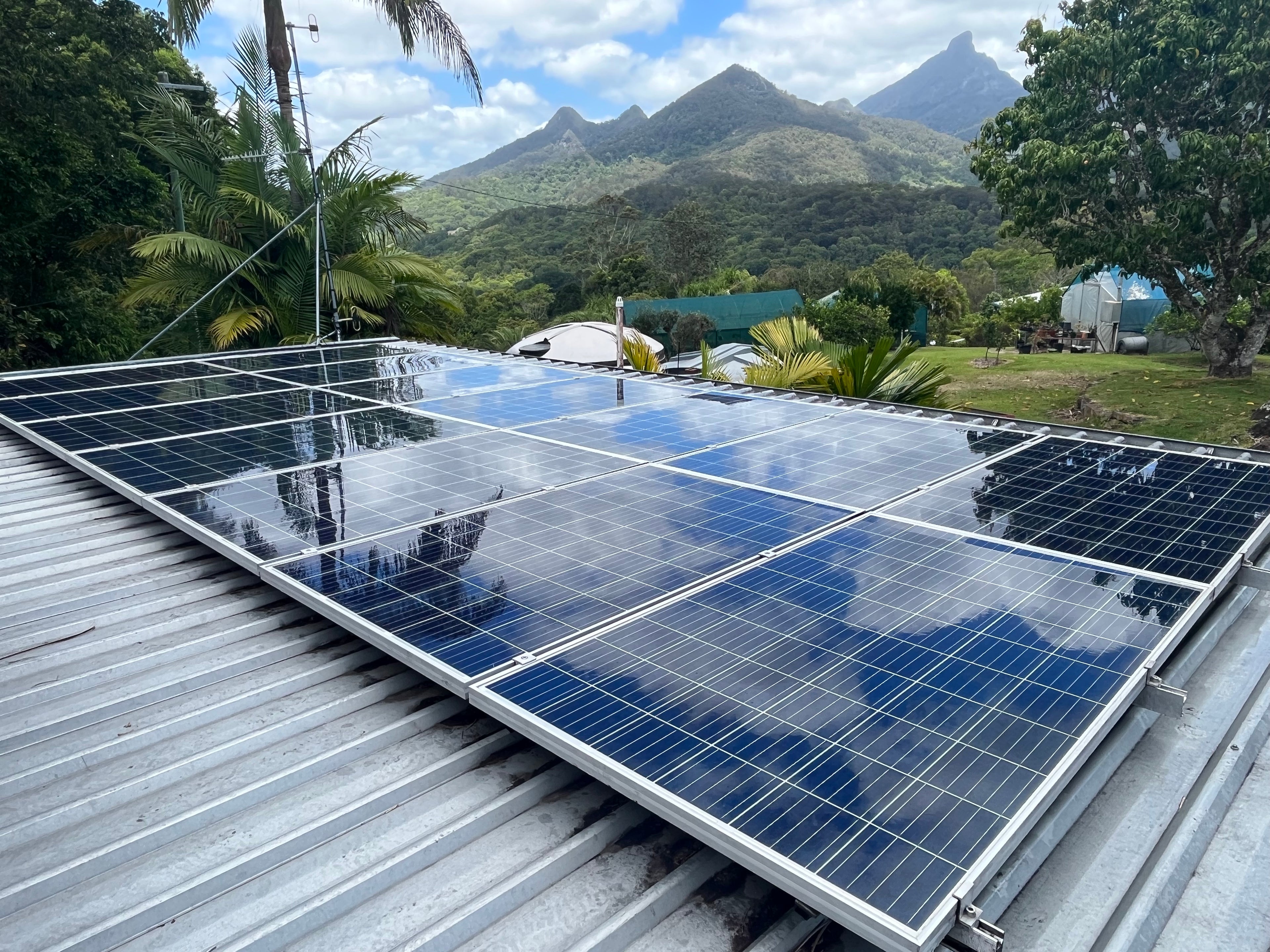 Clean solar panels with Mt Warning in the background